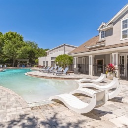 a pool behind a house